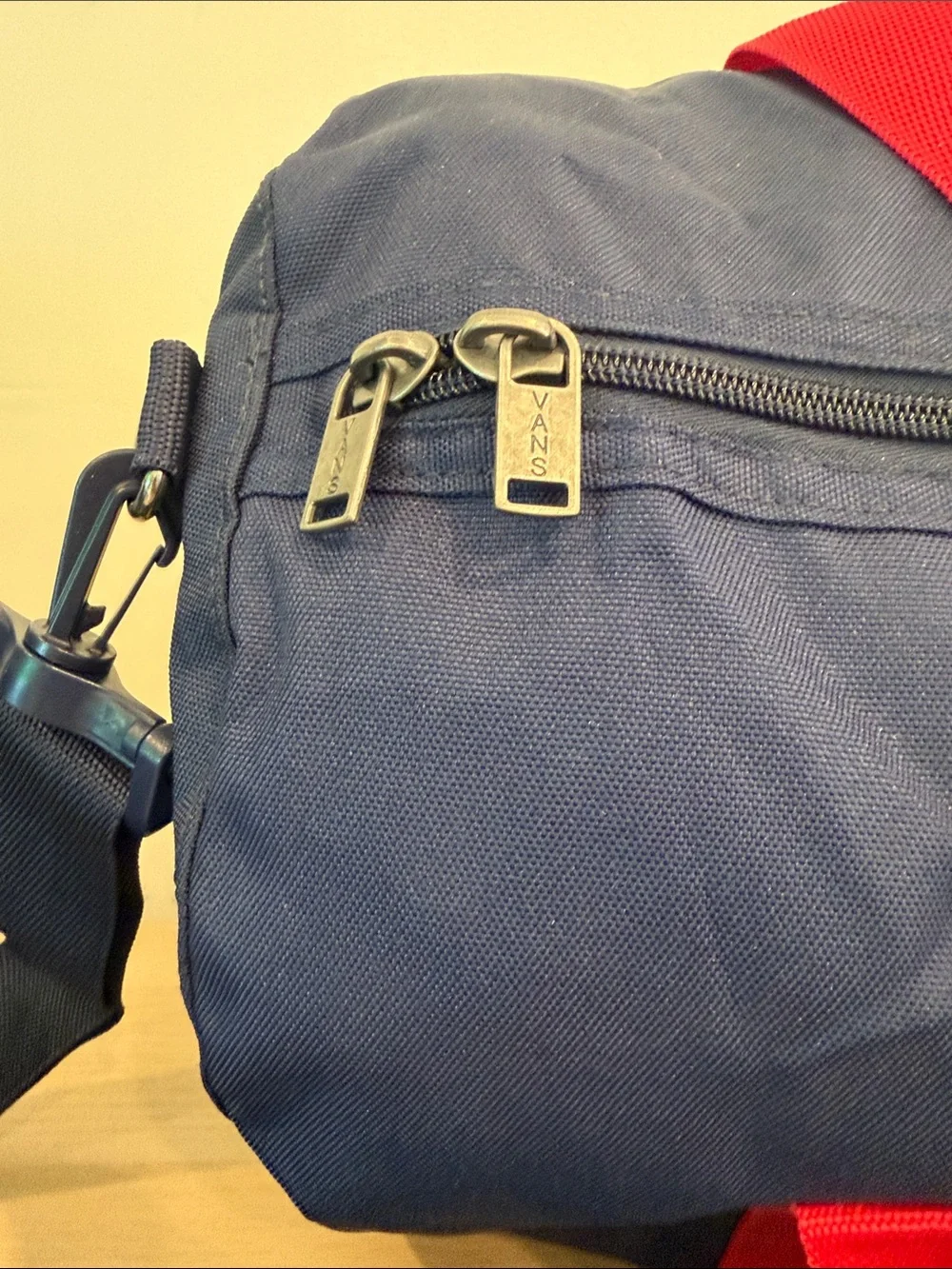 Vans Navy Duffel with Red Straps and Blue Trim